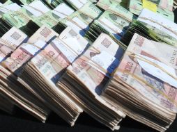 En un momento Rojas Toledo deja ver cierta incomodidad por la entrega de los fajos de dinero en ese sitio. NTX / ARCHIVO