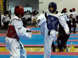 Omar Alexis Reyes (azul) ganó en la categoría Juvenil Mayor -58 kilogramos. FACEBOOK / code.jalisco