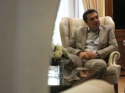''Estamos al final de una negociación muy difícil, pero hacemos todo lo posible para mantener una Europa unida'', aseguró Tsipras. EFE / A. Vlachos