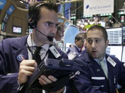 El principal indicador de la bolsa estadounidense restó 28.43 puntos. AP / ARCHIVO