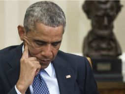 La economía, lucha contra el terrorismo, política exterior y programas de espionaje electrónico, entre las razones de la baja de Obama. AFP / ARCHIVO