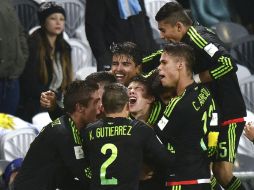 La unión es algo que Almaguer destaca en sus pupilos. AFP / M. Melville