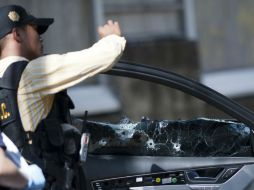 El coche de 'Pancho Palomo' es baleado en un transitado sector de la ciudad de Guatemala. AFP / J. Ordonez