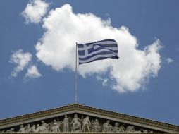 Grecia podría enfrentar una bancarrota, lo que sería el preludio de la salida del euro y el retorno a su antigua moneda, el dracma. AP / P. Giannakouris