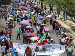 Las organizaciones que están contra las elecciones, han robado 14 casillas electorales. EFE / René Araújo