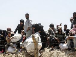 Autoridades turcas les realizaron inspecciones de salud, antes de ser transferidos o se les permitiera unirse a familiares en Turquía. AFP / STR