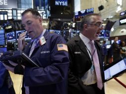 El S&P y el mercado tecnológico Nasdaq tuvieron un incremento ligeramente por debajo del aumento del principal indicador. AP / R. Drew