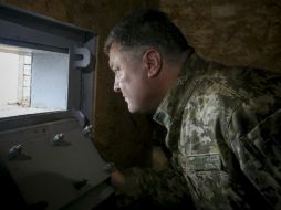 Poroshenko considera que las elecciones son cruciales para que su Gobierno pueda sentarse a negociar. AP / M. Palinchak