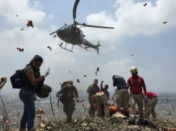 Las autoridades lograron el rescate del adolescente mediante la aeronave. ESPECIAL / Protección Civil Zapopan