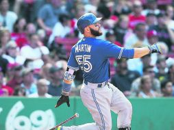 El receptor de los Blue Jays de Toronto, Russell Martin, conectó su décimo jonrón en la temporada. AFP / J. Rogash