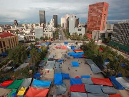 La Sección 22 de Oaxaca continuará el plantón en el Monumento a la Revolución, aunque ya se han ido algunos maestros. SUN / ARCHIVO