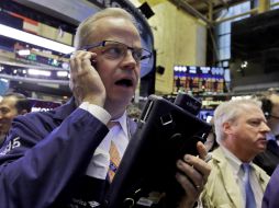 El selectivo S&P 500 tuvo un retroceso un poco menor al del principal indicador, mientras que Nasdaq fue el menos afectado. AP / R. Drew