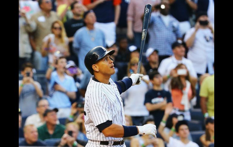 Rodríguez se convirtió en el segundo jugador, detrás de Aaron, con  tres mil o más hits, 600 o más jonrones y dos mil o más impulsadas. AFP / A. Bello