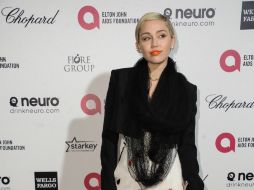 Miley Cyrus declaró que desde adolescente supo que también le gustaban las mujeres. AP / ARCHIVO
