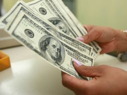 El Banxico informó que el tipo de cambio para solventar obligaciones es de 15.3072 pesos. EL INFORMADOR / ARCHIVO