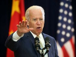 Joseph Biden dice que los dos países deben acordar un sistema de reglamentaciones para temas como el espacio cibernético. AFP / A. Wong