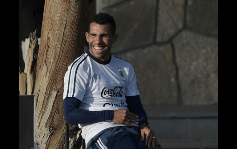 Carlos Tévez es apodado como 'el jugador del pueblo', por su entrega y nacer en un barrio humilde: Fuerte Apache. AFP / J. Mabromata