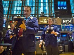 El avance más significativo para la bolsa neoyorquina, de Dow Jones, fue de 99.30 puntos. AP / ARCHIVO