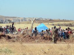 El EI proclamó hace un año un califato en Siria e Irak, donde ha tomado amplias partes de sus territorios. AP /