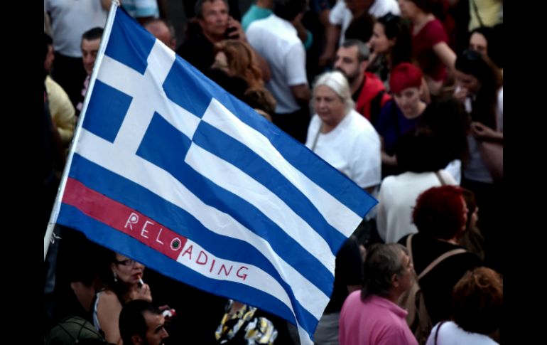 El país debe pagar deudas con el BCE y el FMI. AFP / A. Messinis