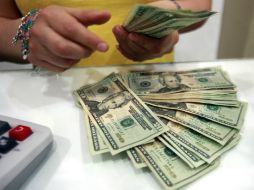 El precio implicó un aumento de tres centavos y se quedó a dos centavos de igualar el récord máximo de 15.7140 unidades. EL INFORMADOR / ARCHIVO