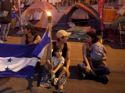 Manifestantes mantienen protestas callejeras contra la corrupción e incluso hacen llamados a la renuncia del presidente. EFE / G. Amador