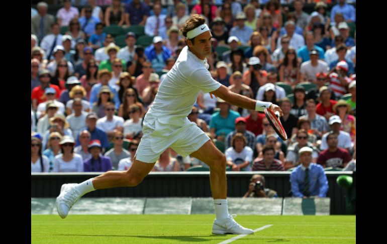 Roger tiene cuatro años sin ganar un grande. AFP / G. Kirk