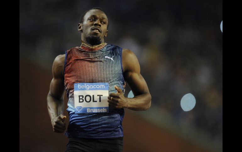 Usain Bolt intentará defender su cetro en 100 metros planos. AFP / ARCHIVO