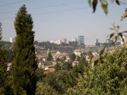 El Heroico Cuerpo de Bomberos reporta el hecho y arriban al lugar para retirar la tierra. FACEBOOK / SAN MATEO TLALTENANGO