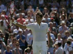 Cuatro parciales necesitó el tenista suizo Roger Federer para deshacerse del australiano Sam Groth. AP / T. Ireland