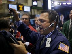 El índice compuesto del mercado Nasdaq perdió hasta cuatro mil 991.94 puntos. AP / ARCHIVO