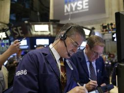 El principal indicador de la bolsa de Nueva York suma 32.47 puntos. AP / S. Wenig