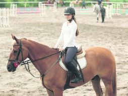 Shirelle Ganon, a lomos de 'Migrante LS', va en primer lugar del Gold Tour del FEI Childrens International Classics. EL INFORMADOR / M. Vargas