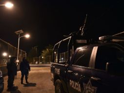 Rubido García detalla que 18 elementos son trasladados a las instalaciones de la SEIDO para ser interrogados sobre la fuga. AFP / Y. Cortez