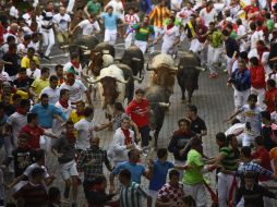Los encierros son un elemento tradicional de las fiestas de verano en toda España. AP / A. Barrientos