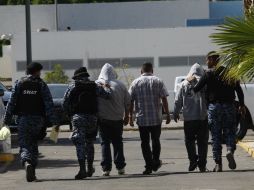 Son tres los detenidos por portar billetes falsos de pesos y dólares. EL INFORMADOR / ARCHIVO