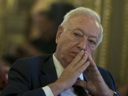 El canciller Margallo pidió máxima discreción sobre el caso pero llamó a la tranquilidad, recordando apariciones de otros periodistas. AP / P. White