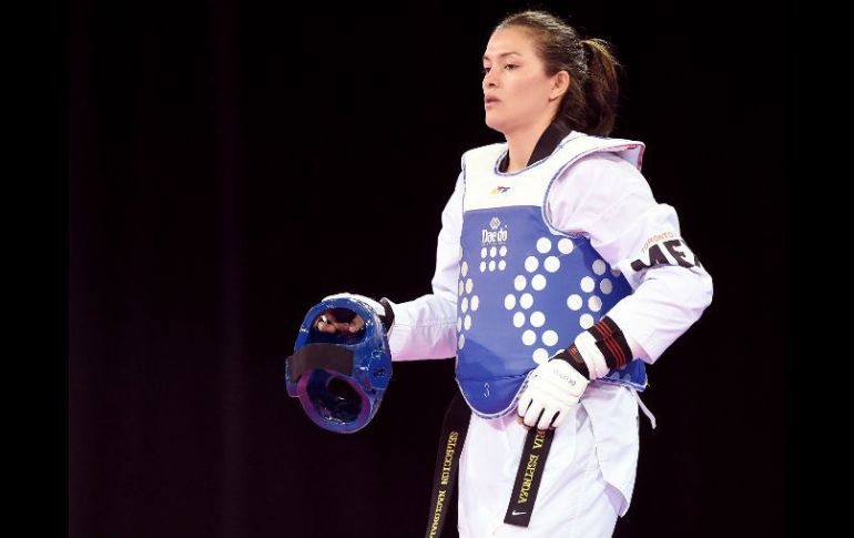La campeona olímpica en Beijing 2008 y medallista de bronce en Londres 2012 tuvo pase automático a la ronda de cuartos de final. AP / H. How