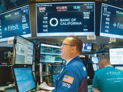 Wall Street. Le pegaron las empresas. BLOOMBERG  /