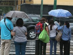 Se espera cielo medio nublado a nublado, probabilidad de lluvia de 80 por ciento con tormenta eléctrica y caída de granizo en Jalisco. NTX / ARCHIVO