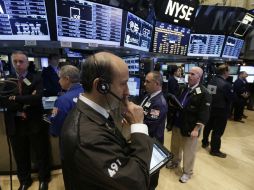 El Dow Jones tuvo ganancias con lo que logró frenar una racha bajista de cinco días consecutivos. AP / ARCHIVO