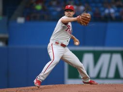 Adam Morgan admitió dos carreras y cinco hits en seis innings. AFP / T. Szczerbowski