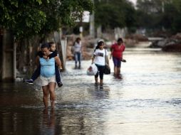 Uno de los barrios afectados por la inundación es el de Bañado Norte. AP / J. Saenz