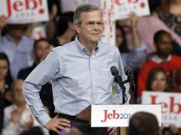 Bush propone aprender inglés y pagar una multa como requisitos. AP / ARCHIVO