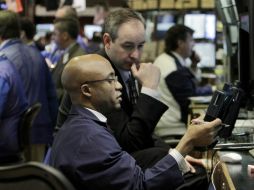 El selectivo S&P 500 retrocedió, al igual que el índice compuesto del mercado Nasdaq. AP / ARCHIVO