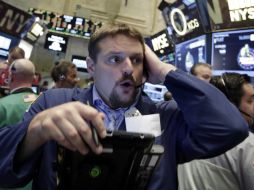 La jornada estuvo marcada por la espera de conocer el informe oficial de empleo. AP / R. Drew