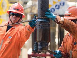 Trabajadores. Les cambian contrato.BLOOMBERG  /