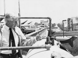 Alejandro Zohn acudía a revisar las obras con un virote en las manos; entre un bocado y otro recorria el lugar. EL INFORMADOR / ARCHIVO