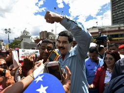 El gobierno de Nicolás Maduro importa bienes que después se distribuyen a bajo costo; mas suelen terminar en las manos equivocadas. AFP / J. Barreto