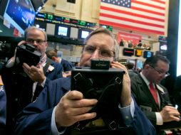 El Dow Jones frenó siete días consecutivos a la baja, animado por los avances en las negociaciones de Grecia. AP / ARCHIVO